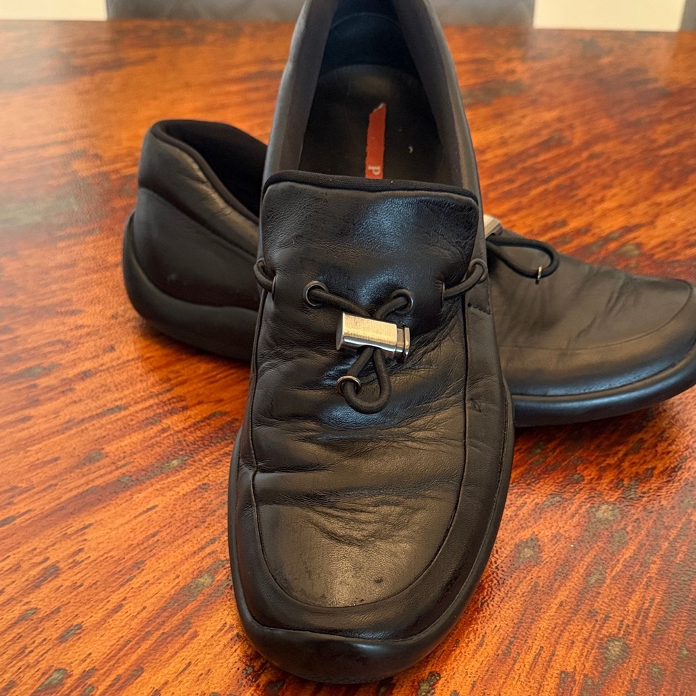 Prada Black Leather Loafers with Silver Accent